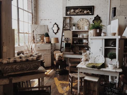 Cluttered room full of vintage and furnishings